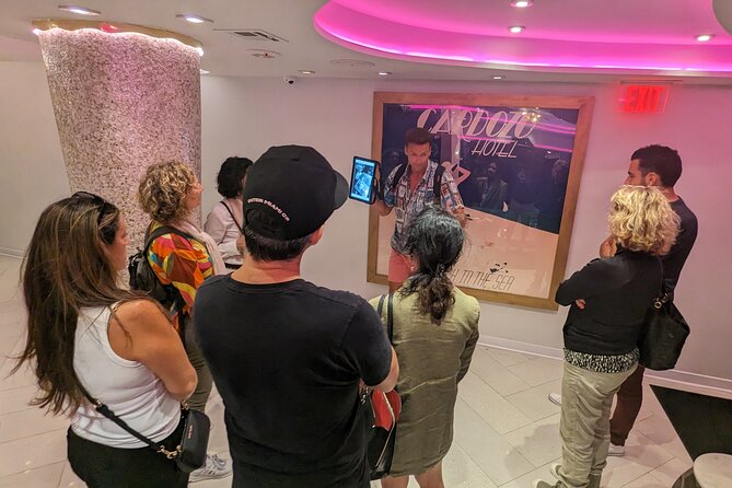 Award-winning Art Deco & Neon Lights Walking Tour in Miami Beach - Collins Avenue and the city on screen