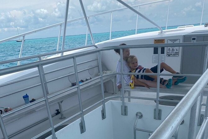 Day Tour Glass Bottom Boat In Islamorada - Watching the water through the boat’s glass floor