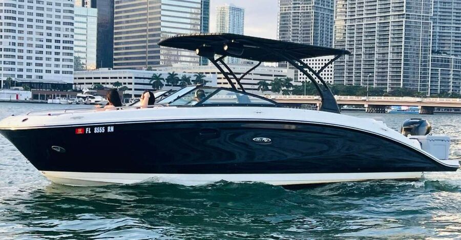 Miami: Guided Boat Tour with Champagne - Following the Miami River toward the skyline